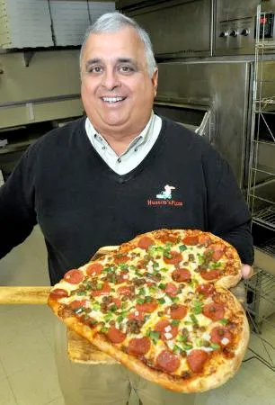 About Husson's Pizza About Husson's Pizza